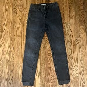 10" High-Rise Skinny Jeans with distressed ankle detail